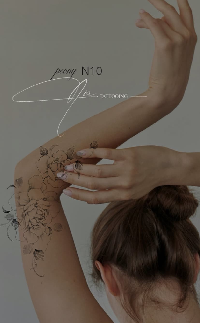 Peony N10 — fine line peony on arm · Nia Tattooing